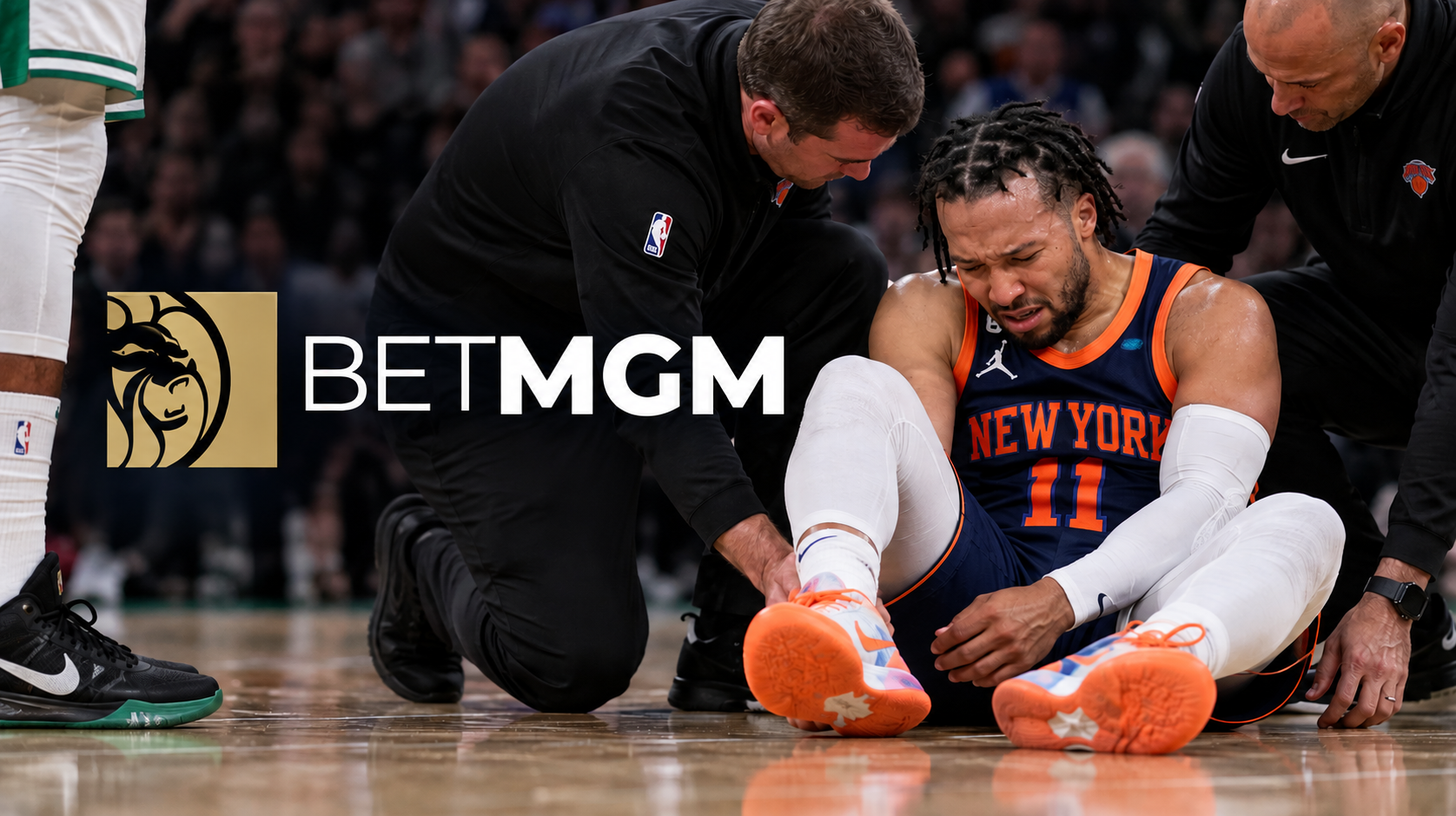 BetMGM BetDefense NBA injury protection featuring an injured New York Knicks player receiving medical attention on the court.